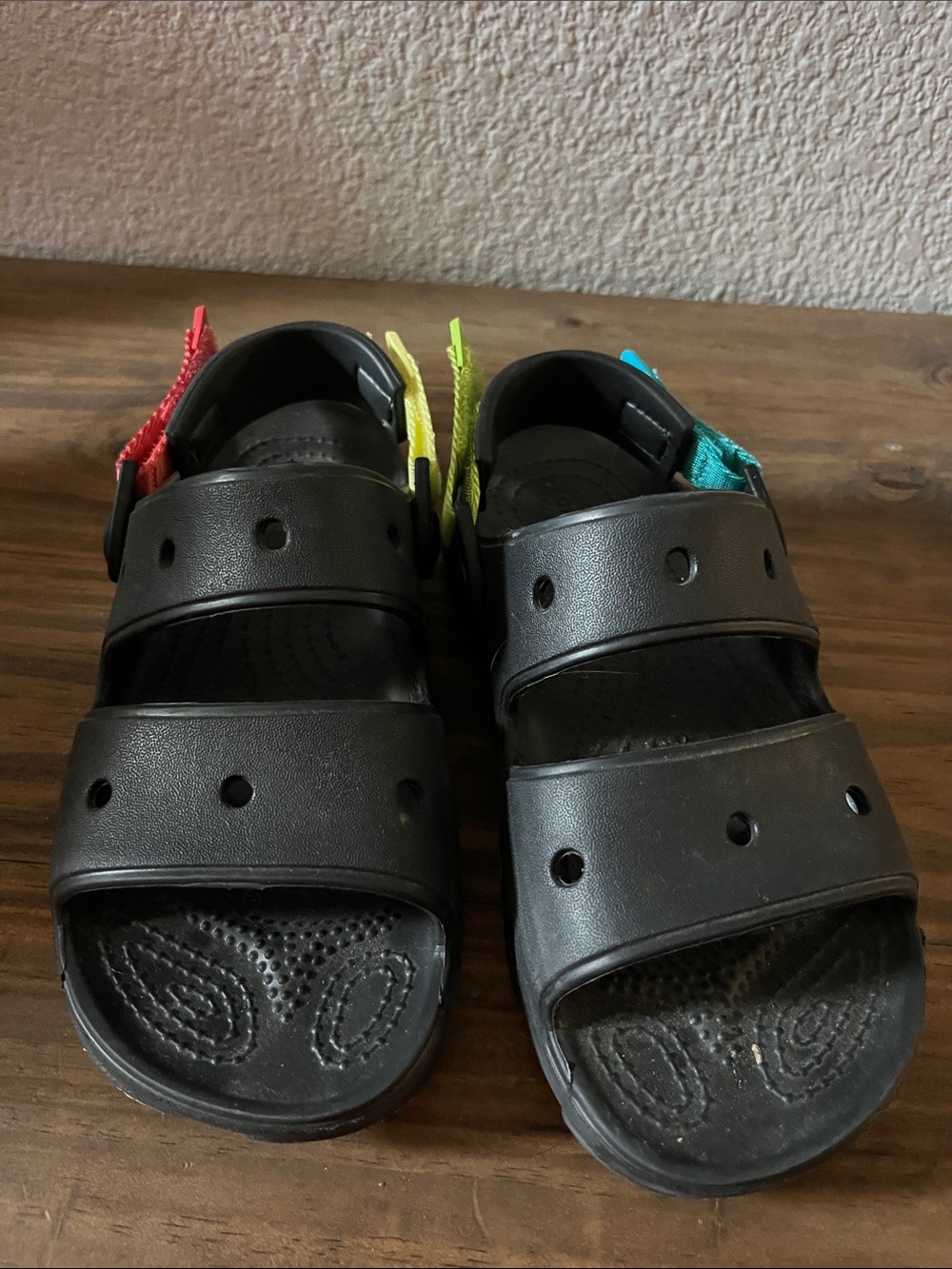 CROCS Black Kids Sandals with Red, Yellow and Teal Straps